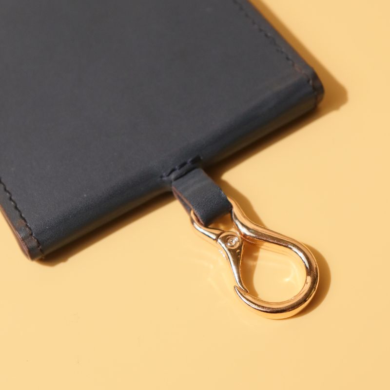 Hanging Vanity Mirror Case-Deep Blue leather-gold plated metal hook-polished glass mirror-hook detail view-The Bicyclist