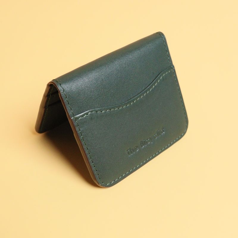 Handmade Leather unisex bifold card wallet-darkgreen-fullgrain leather body-purple sheep leather lining-front angle view-The Bicyclist