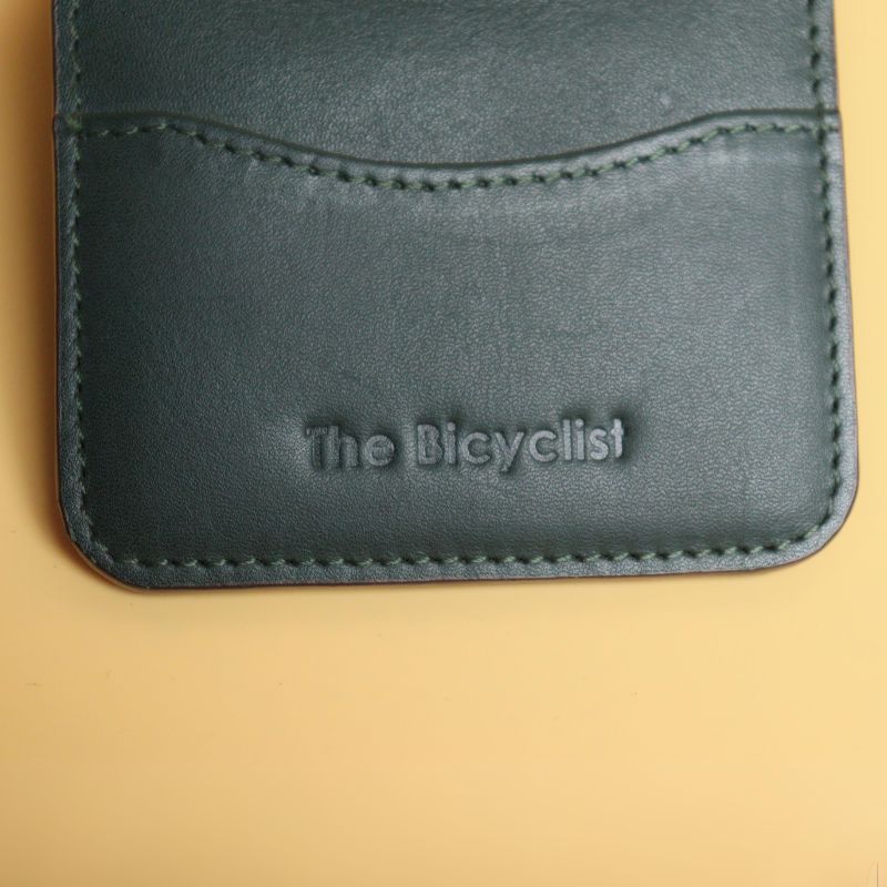 Handmade Leather unisex bifold card wallet-dark green-full grain leather body-purple sheep leather lining-front detail view-The Bicyclist