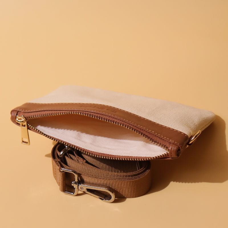 Canvas and Leather Compact Pouch Sling Bag-Off White Canvas and tan leather-gold plated metal hook-front open-The Bicyclist