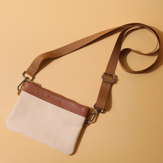 Canvas and Leather Compact Pouch Sling Bag-Off White Canvas and tan leather-gold plated metal hook-front top angle-The Bicyclist