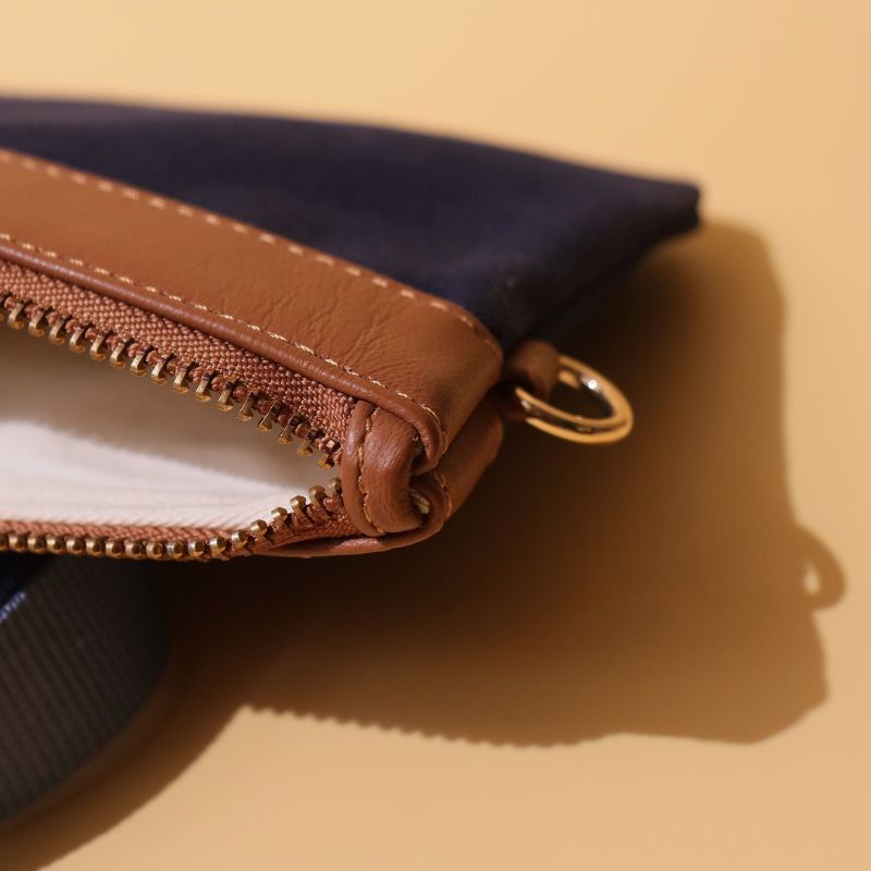 Canvas and Leather Compact Pouch Sling Bag-Deep Blue Canvas and tan leather-gold plated metal hook-front open detail-The Bicyclist