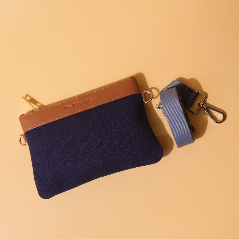 Canvas and Leather Compact Pouch Sling Bag-Deep Blue Canvas and tan leather-gold plated metal hook-front angle -The Bicyclist