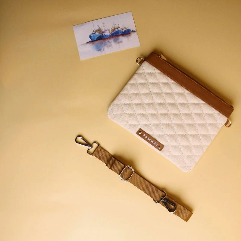 Canvas and Leather Quilted Zip Pouch Sling Bag-Off-white Canvas and tan leather-gold plated metal hook-top view-The Bicyclist