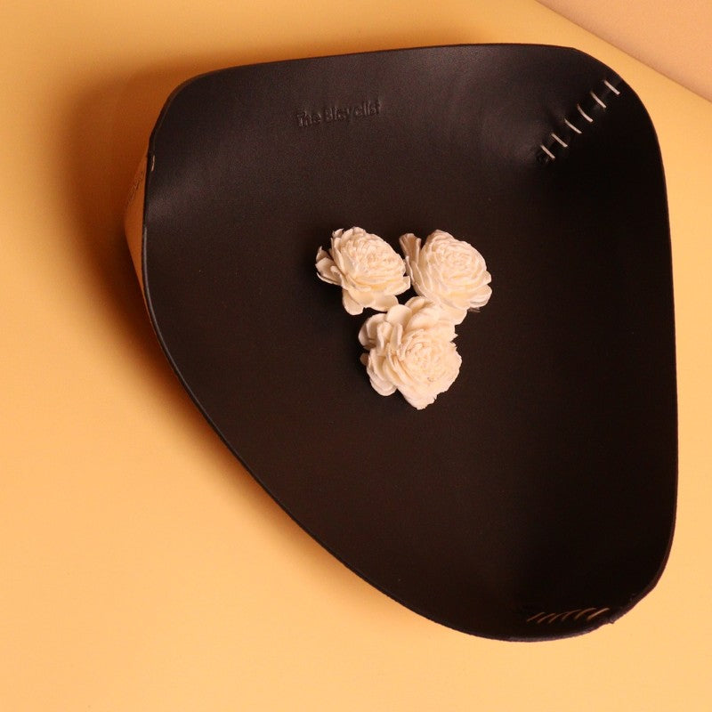Triangular Black Leather Valet Tray with White Stitches for Office Desk and Bar Tables top view