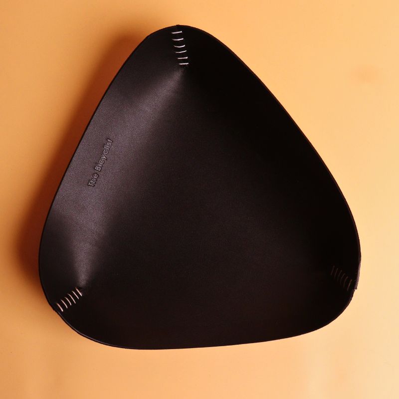 Triangular Black Leather Valet Tray with White Stitches for Office Desk and Bar Tables top view