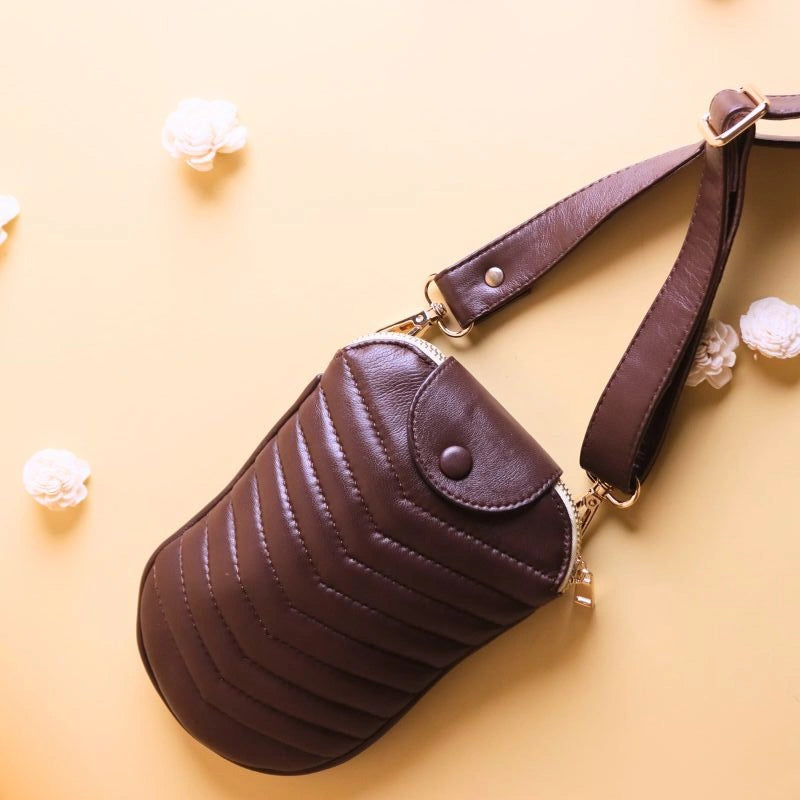 Table Top View of a Dark Brown Quilted leather crossbody sling bag