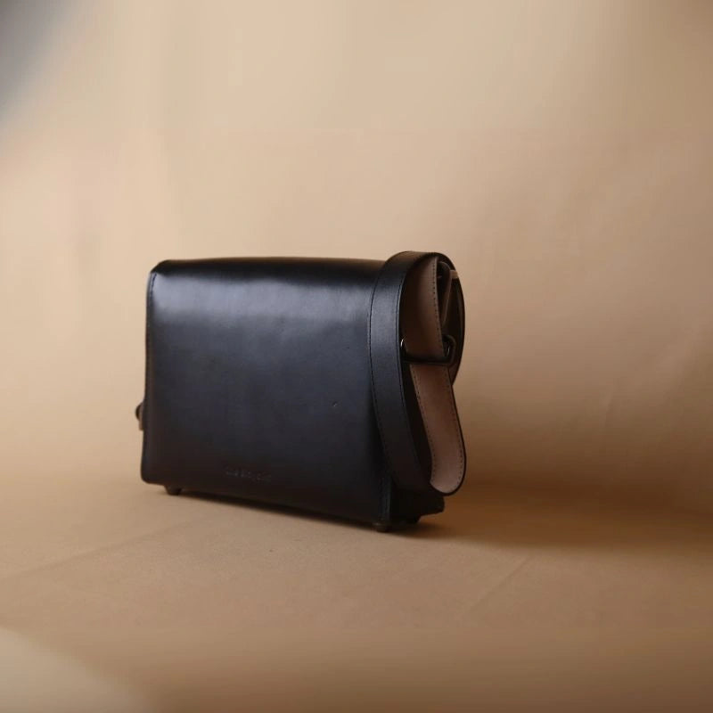 Back view of Black Leather Crossbody Sling Bag with Flap