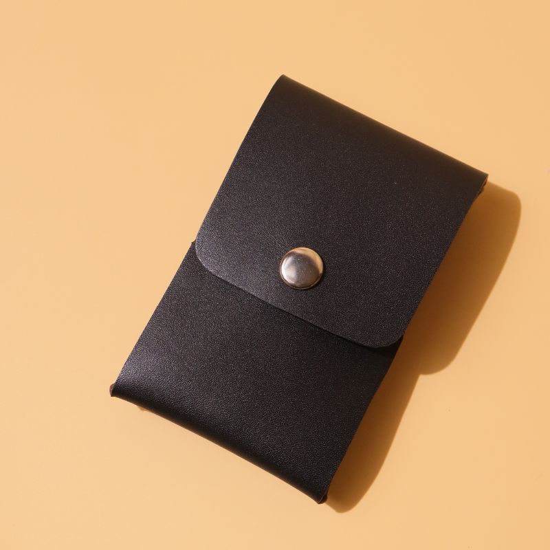Compact Card Holder-Black Full grain Bovine leather-gold metal snap button-front angle view-The Bicyclist