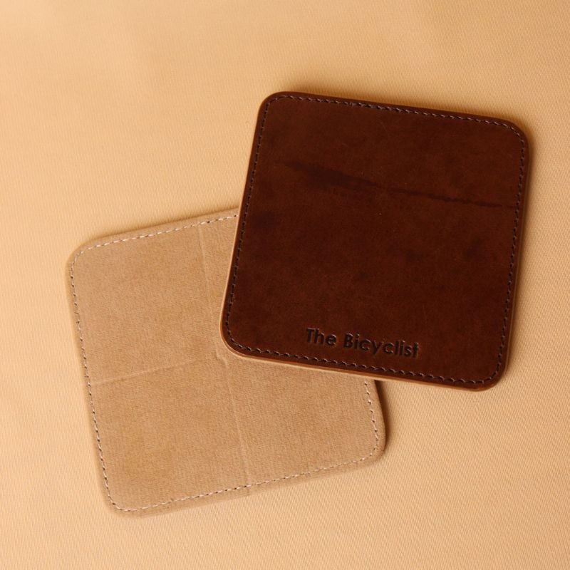 Handmade Leather Coaster-Dark Brown-fullgrain harness leather-beige felt base lining-front and back view-The Bicyclist