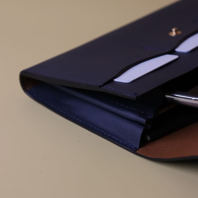 Detailed view of the accordion side panel of the Large Womens Clutch Wallet with hand painted edges