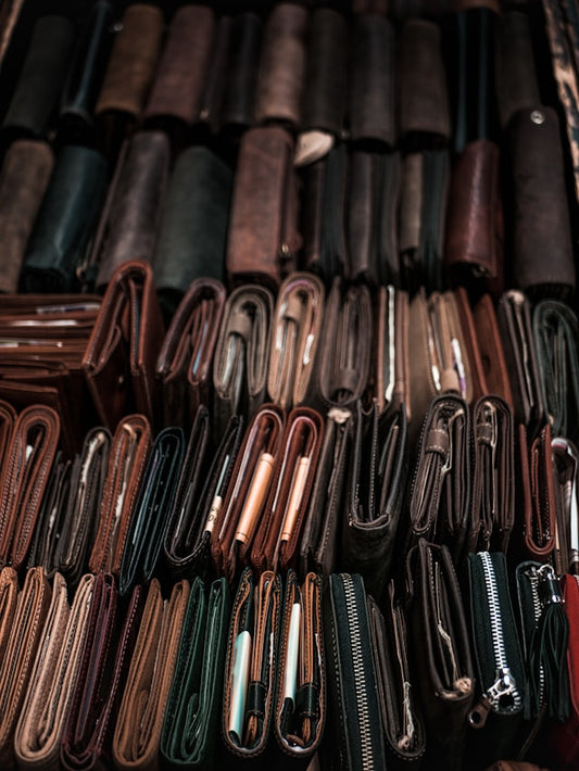 Rows of leather wallets stacked against each other