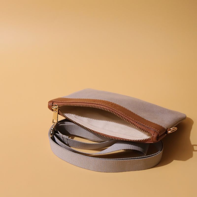 Canvas and Leather Compact Pouch Sling Bag-Light Grey Canvas and tan leather-gold plated metal hook-front angle open-The Bicyclist