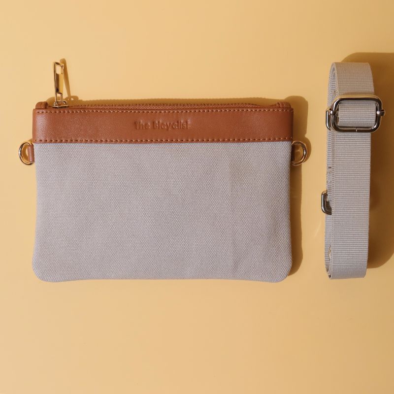 Canvas and Leather Compact Pouch Sling Bag-Light Grey Canvas and tan leather-gold plated metal hook-front view-The Bicyclist