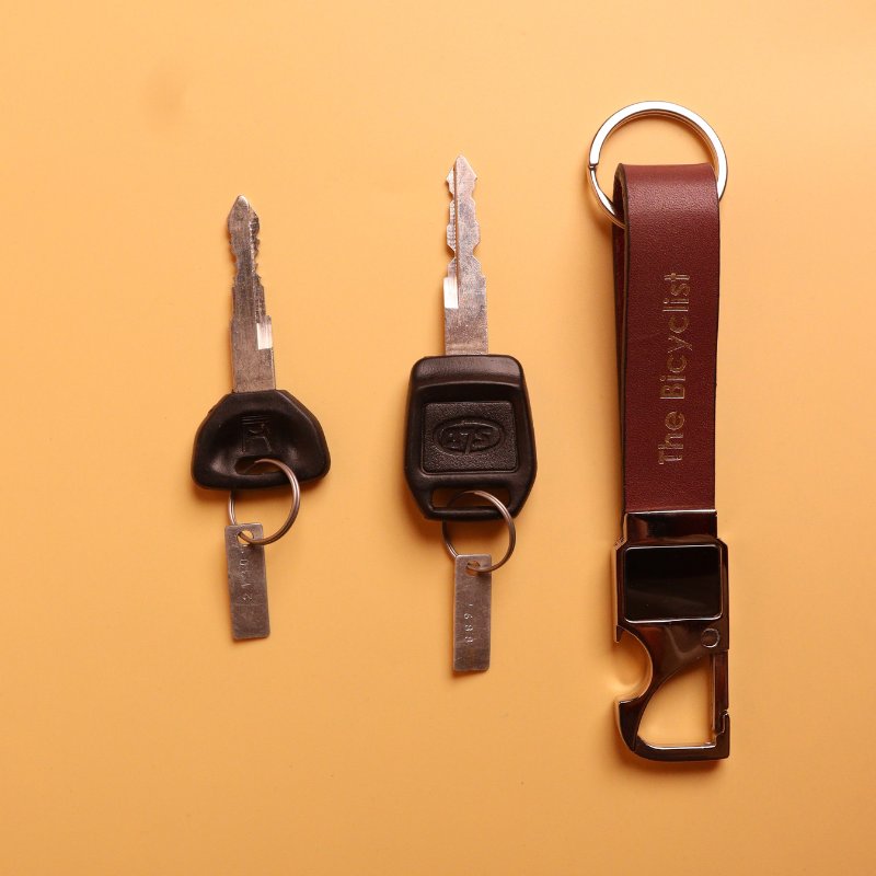 Deep Red Leather Loop Keychain with a Metal spring Hook in electroplated chrome finish  top view with keys