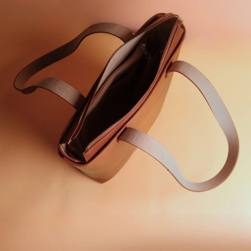 Top Internal View of a Tan Leather Tote Bag with a zipped closure