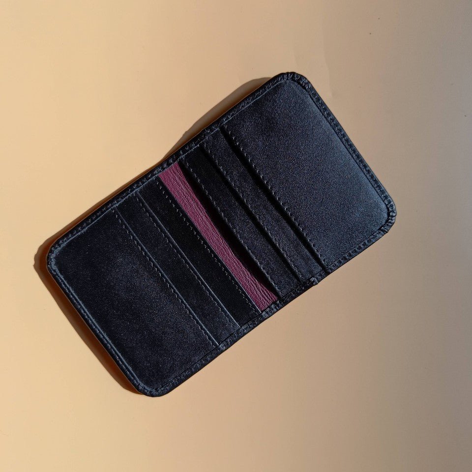 Handmade Leather unisex bifold card wallet-black-fullgrain leather body-purple sheep leather lining-open view-The Bicyclist